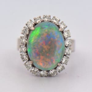 vintage grey base opal and diamond halo cocktail ring