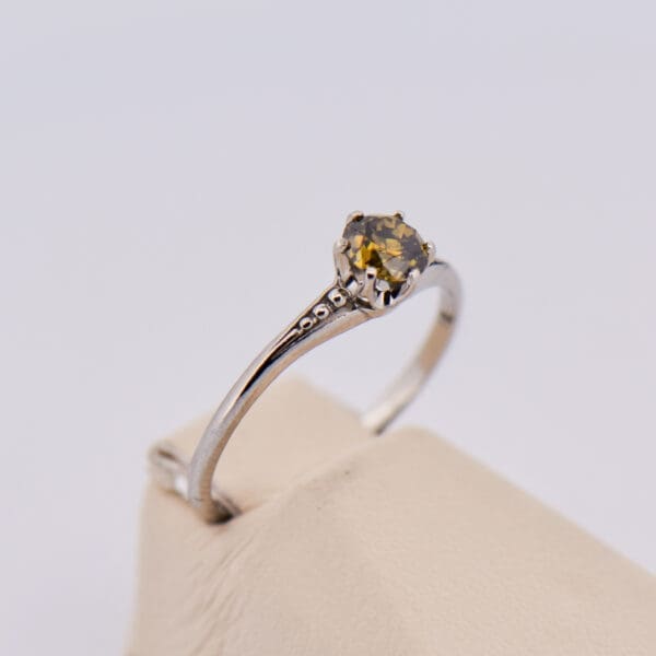 antique platinum solitaire ring with fancy kahki green diamond 3