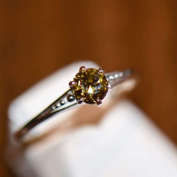 antique platinum solitaire ring with fancy kahki green diamond 6