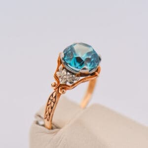 art deco yellow gold and blue zircon ring