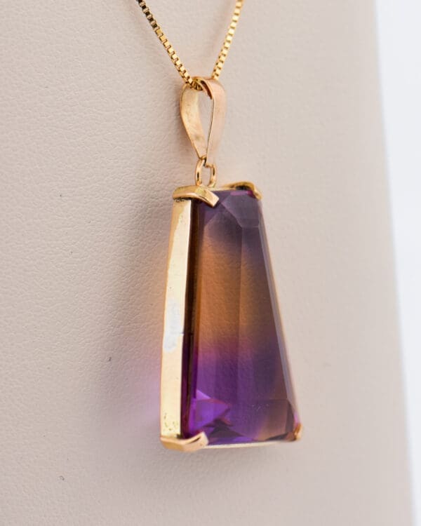 trapezoidal bolivian ametrine pendant in yellow gold 2