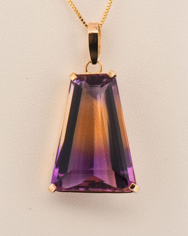 trapezoidal bolivian ametrine pendant in yellow gold