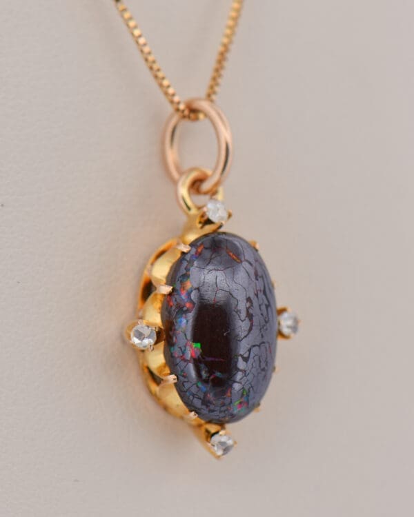 victorian 15k british pendant with boulder opal and rose cut diamonds