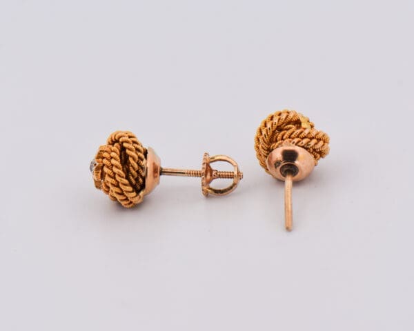 victorian gold love knot stud earrings with diamond accents 2