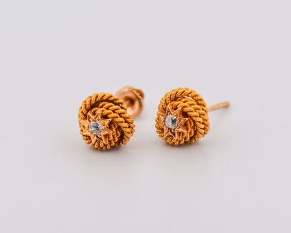 victorian gold love knot stud earrings with diamond accents