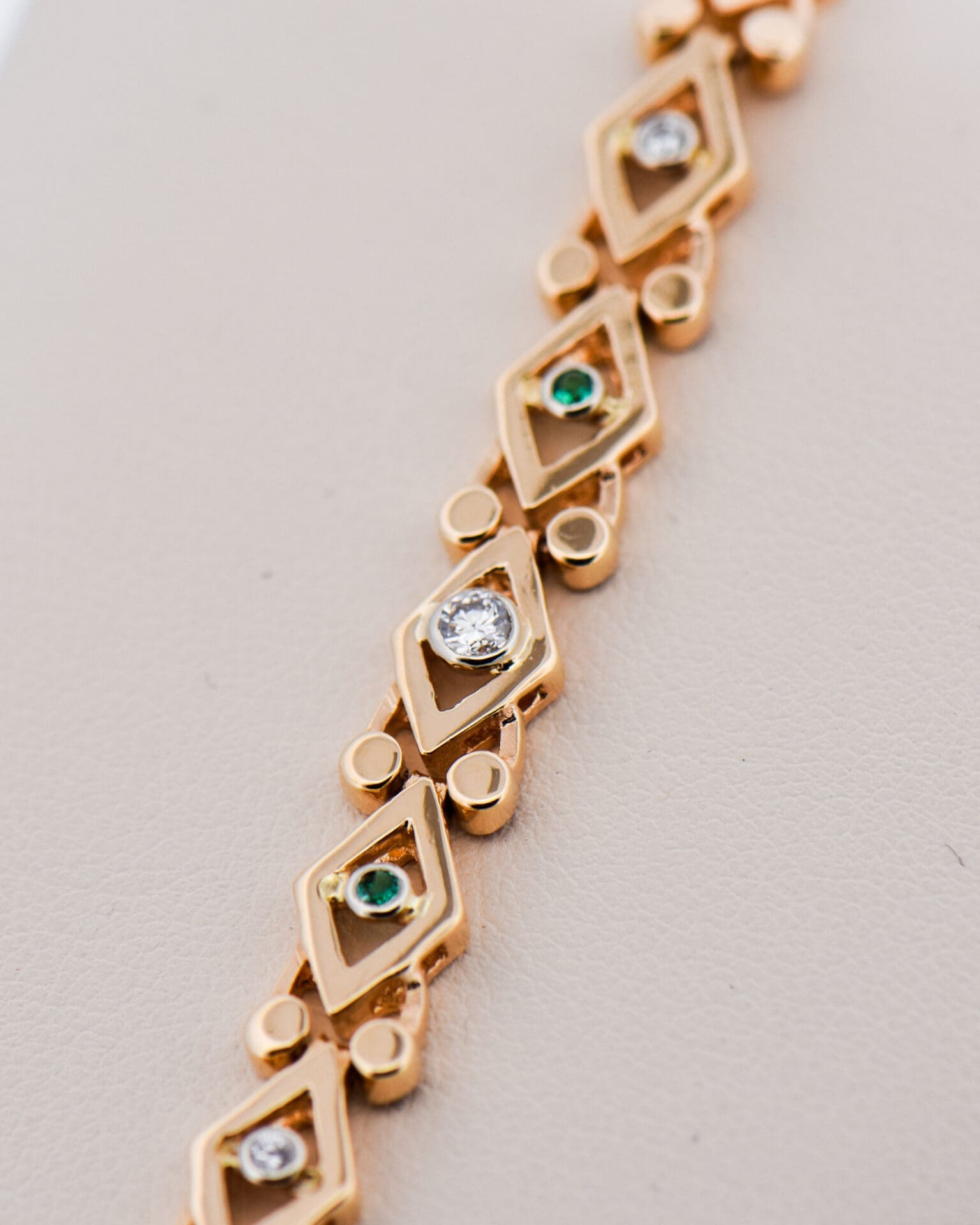 vintage yellow gold geometric link bracelet with emeralds and diamonds 4