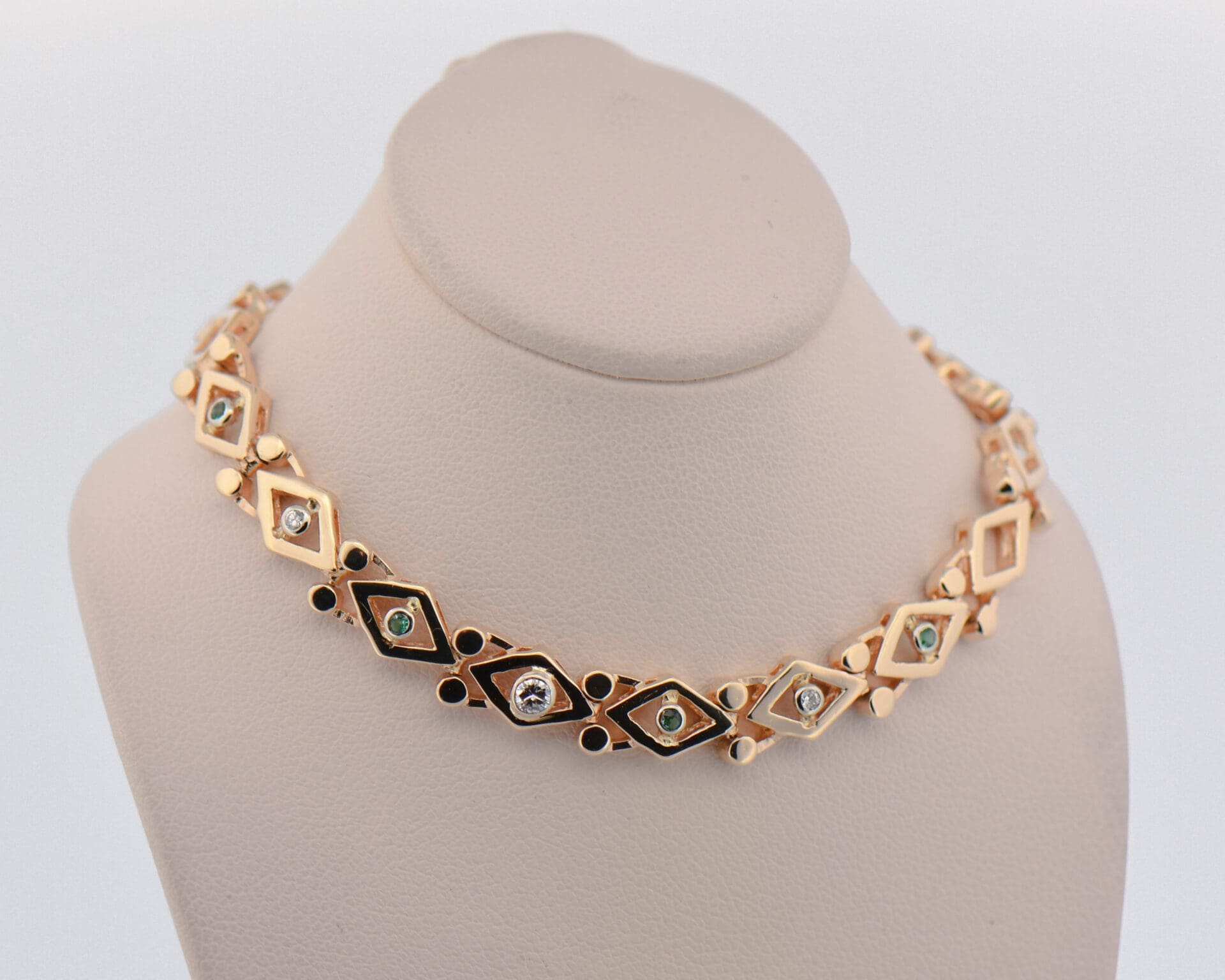 vintage yellow gold geometric link bracelet with emeralds and diamonds 6